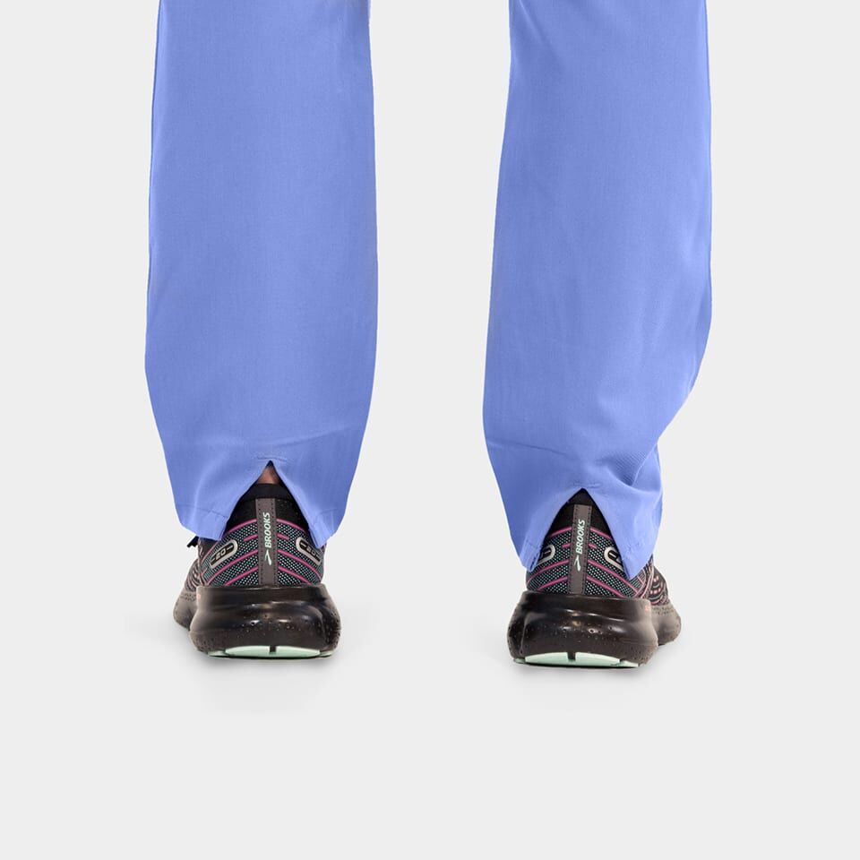 Elite-by-IRG_3852-WomensSportyDoubleV-NeckTop-7801-WomensHalfKnitTaperedLegPant-3811-WomensSidePocketJacket-CeilBlue-CBL-03-IRG-Scrubs-1-1.jpg